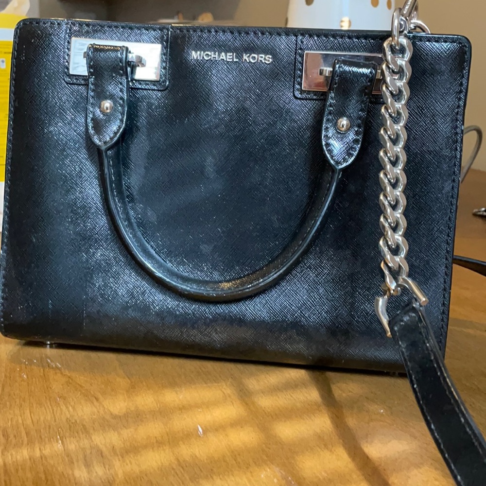 Michael Kor’s black cross body purse